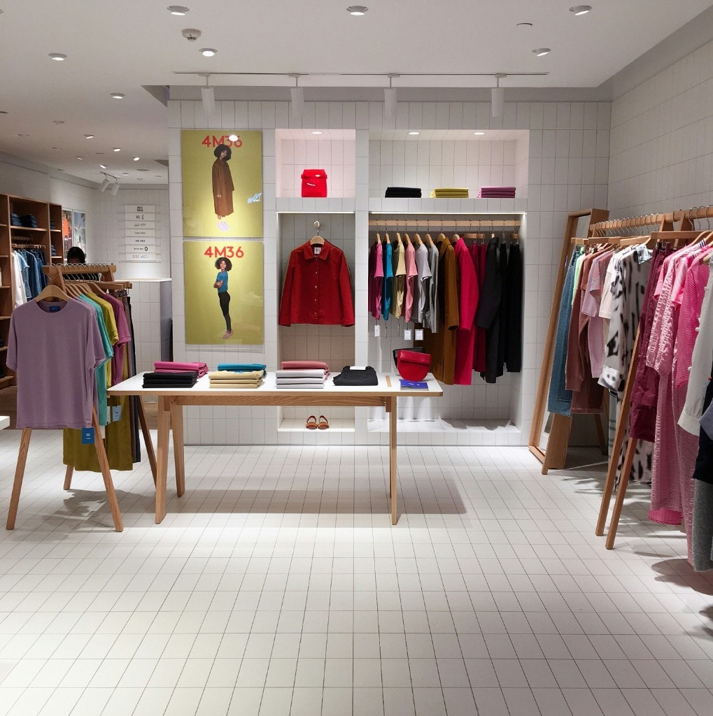 Busy retail store floor with products ready for checkout